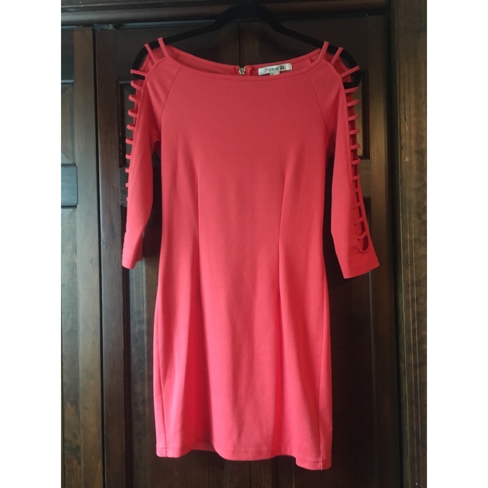 Coral tight dress with open arm cutout